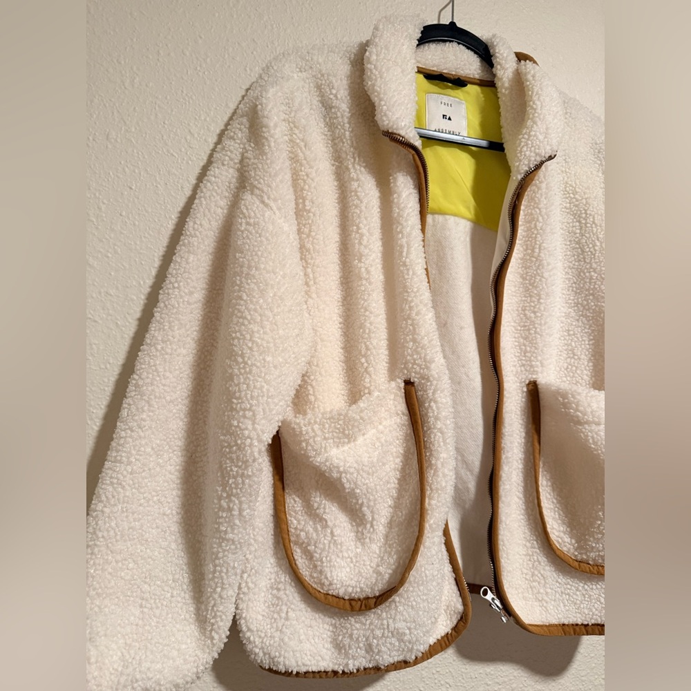 Elegant Cream Teddy Jacket with Brown Trim - Picture 2 of 6